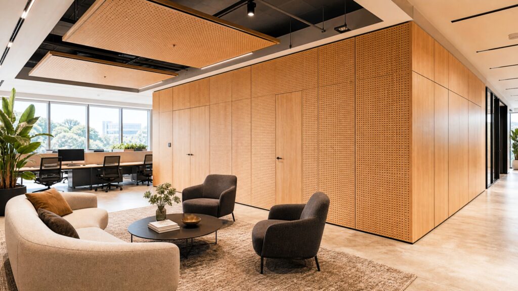 Luxury commercial office interior featuring Murano perforated timber acoustic wall panels and ceiling panels with natural timber veneer.